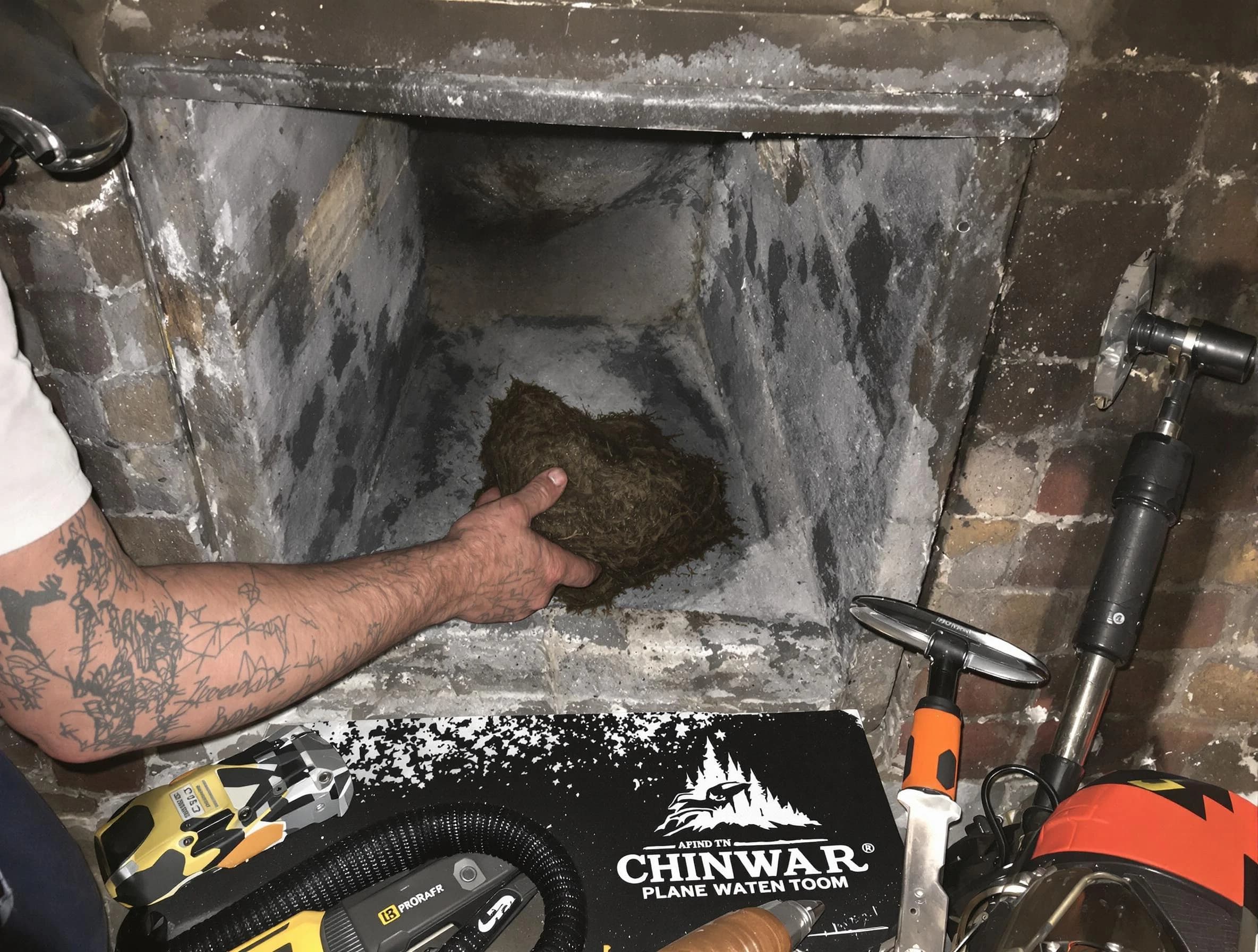 Plainsboro Chimney Sweep safely removing debris and screening chimney in Plainsboro, NJ